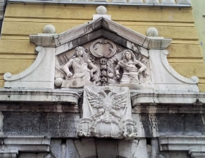 Reljefi careva Leopolda l. i Karla Vl. na portalu riječkog gradskog tornja